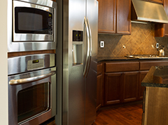 Silver appliances in kitchen